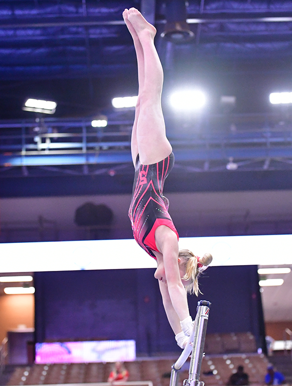 Caroline Musschoot competing in Level 10 gymnastics – D1 recruit from Marengo, Illinois